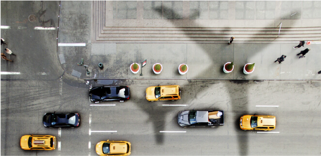 airplane over taxis